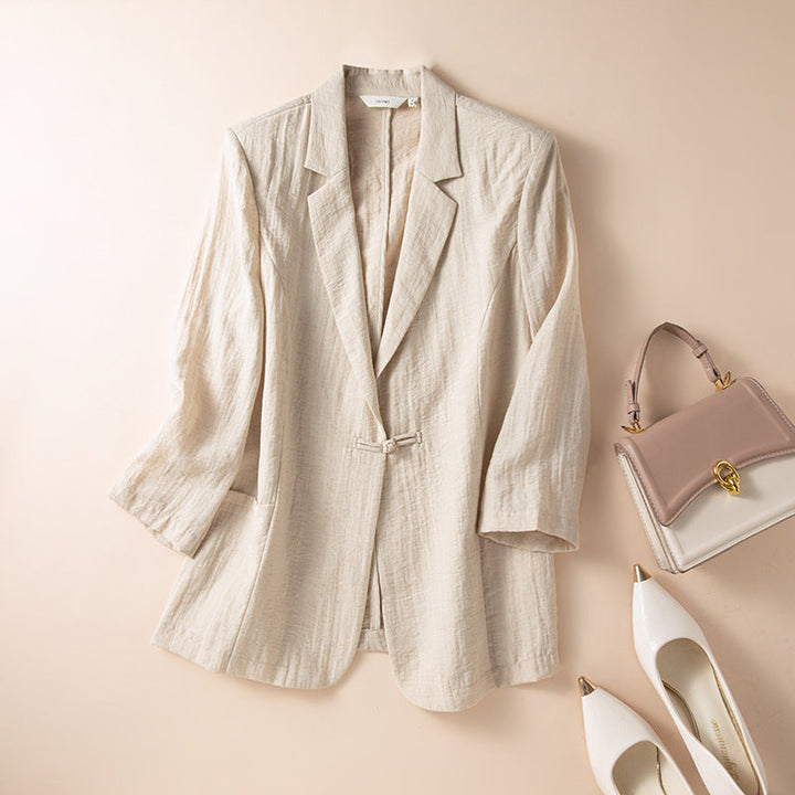 Chic cream women's single-button blazer jacket, ideal for versatile fall fashion & workwear.