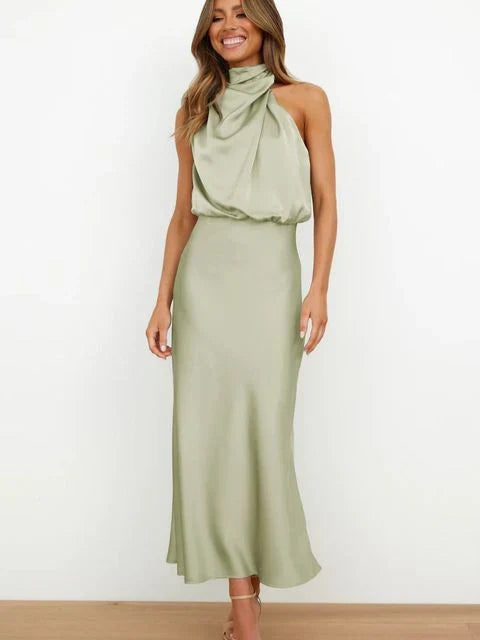 Elegant women's sleeveless cocktail dress for special occasions. Perfect formal party wear.