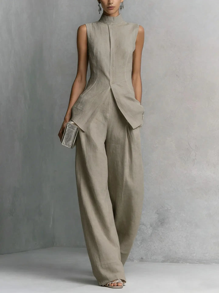 Chic women's sleeveless high neck wide leg jumpsuit for versatile day to night wear, a modern special occasion outfit.