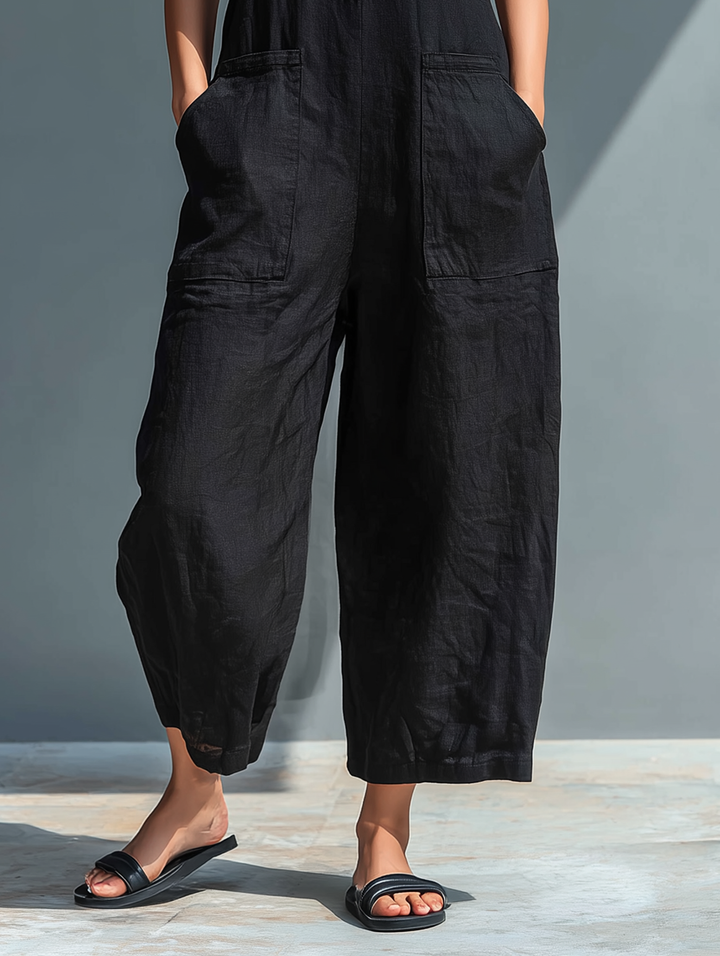 Effortless women's sleeveless jumpsuit for a chic one-piece look. Relaxed fit, versatile for any sophisticated event.