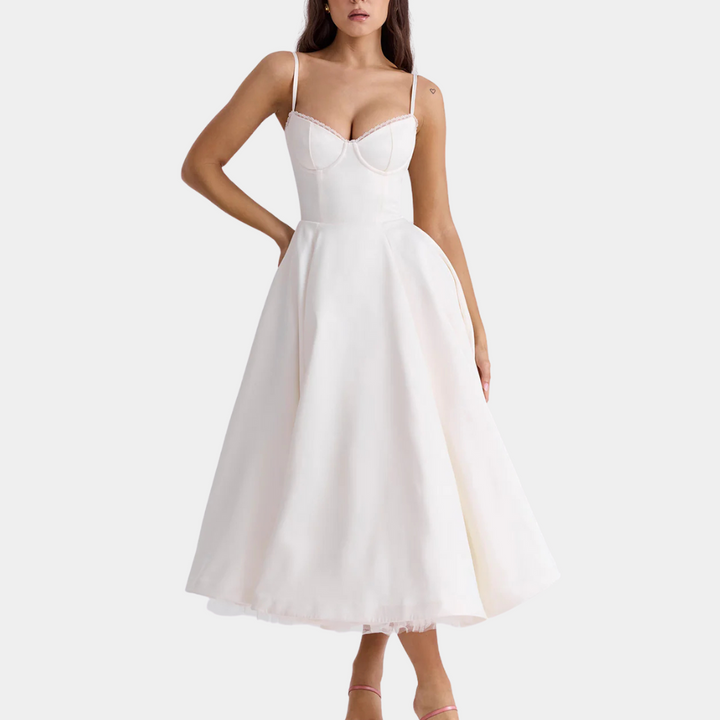Elegant women's sleeveless midi dress, perfect for versatile day-to-evening wear. Fashionable & comfortable.