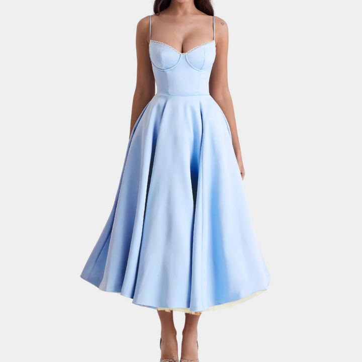 Comfortable & elegant women's midi dress. A fashionable choice for both casual and evening events. Versatile style.