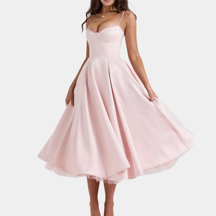 Women's fashionable midi dress. Versatile, comfortable, and elegant. A timeless solid color sleeveless design.