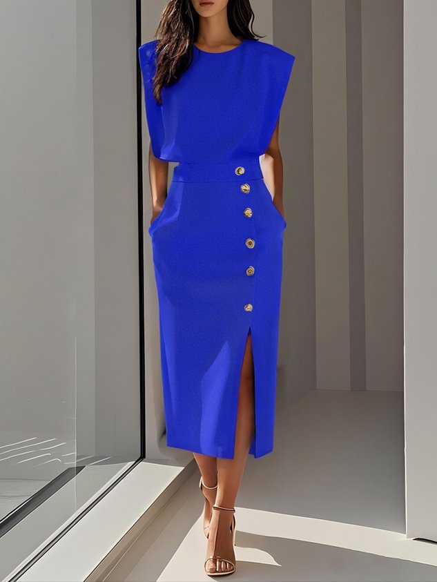 Office-appropriate women's sleeveless midi dress, chic, with a stylish slit & elegant gold buttons.