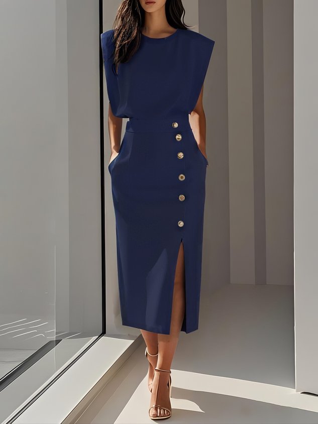 Tailored sleeveless midi dress for women, elegant, with a modern side slit & golden button accents.