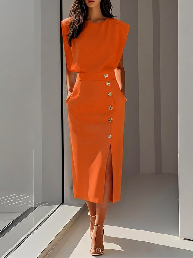 Fashionable women's sleeveless midi dress, versatile, with a flattering slit & decorative gold buttons.