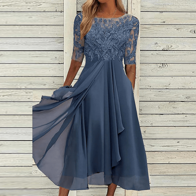Elegant women's sleeveless midi summer dress. Chic & comfortable for versatile casual or party wear. Effortless style.