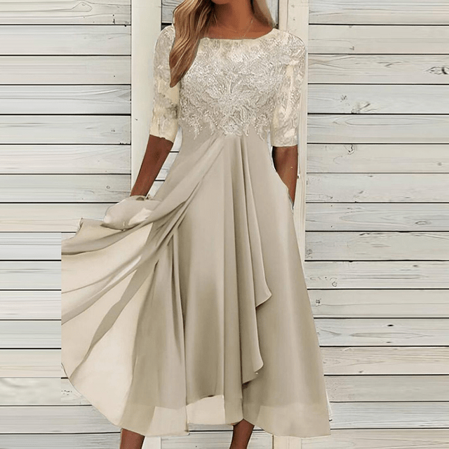 Effortless style with this elegant women's summer dress. Chic sleeveless midi length, comfortable for any occasion.