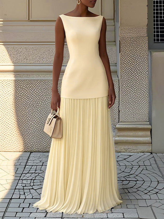 Women's sleeveless pleated maxi dress. Long elegant design for formal events & evening parties.