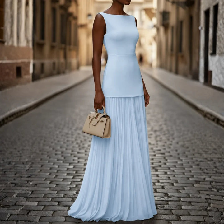 Elegant women's sleeveless pleated maxi dress with boat neck, perfect for formal events & special occasions.