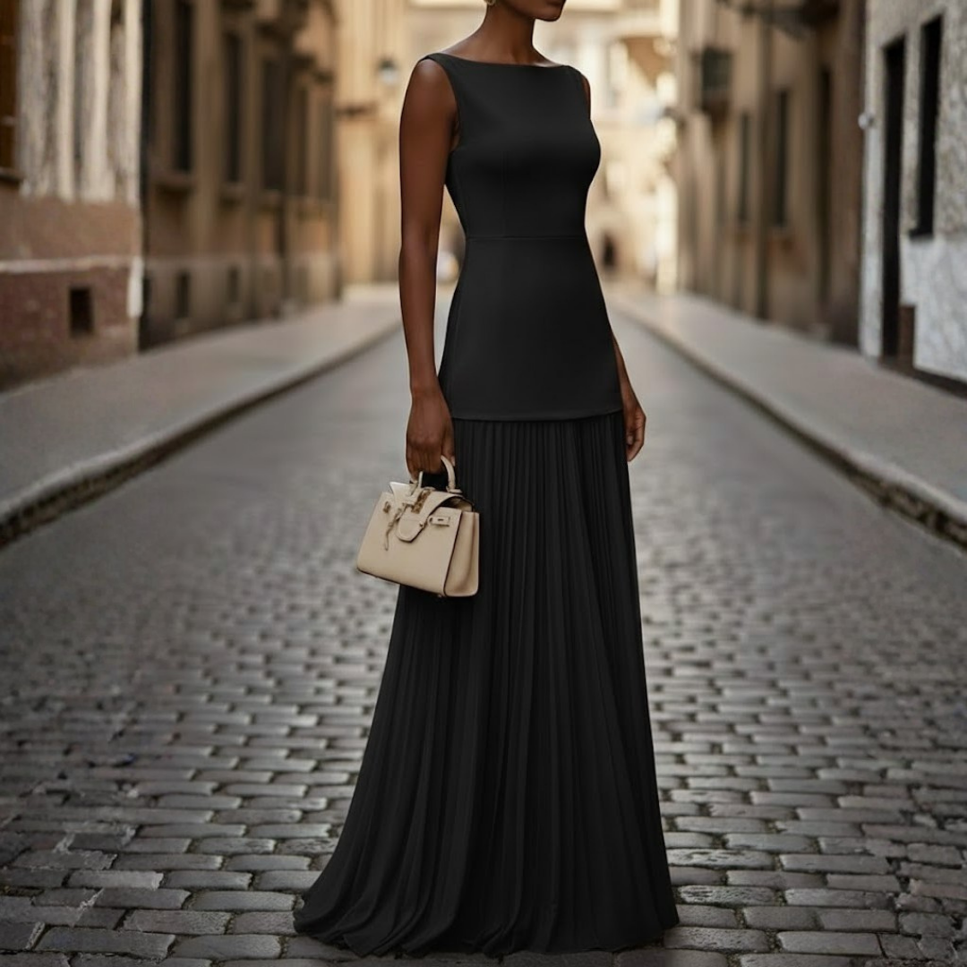 Women's sleeveless pleated maxi dress featuring a chic boat neck, suitable for elegant evening wear.