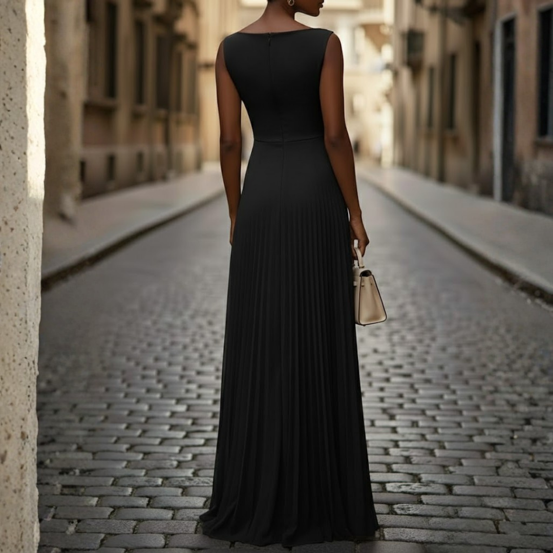 Comfortable sleeveless maxi dress for women, featuring a boat neck and flowing pleats for a stylish look.