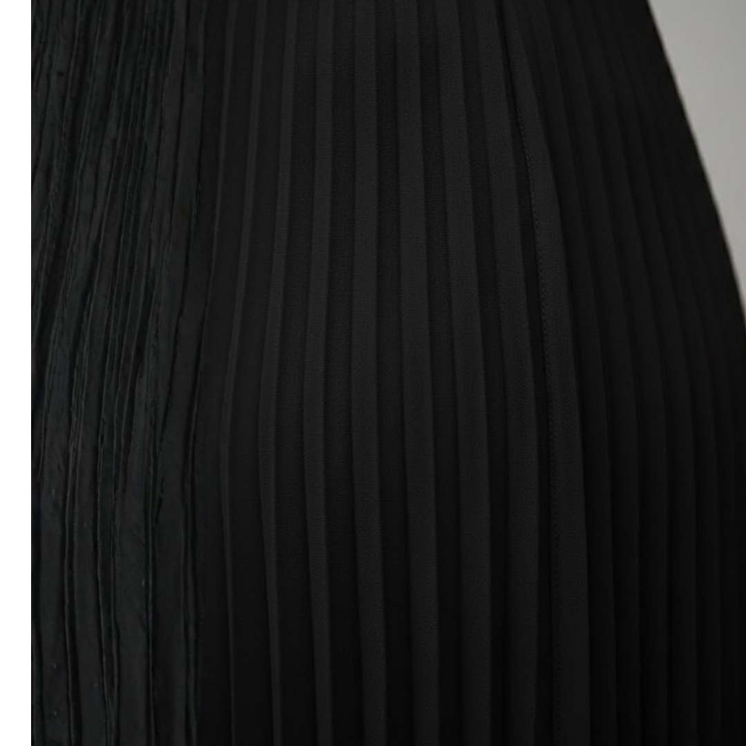 Formal women's evening gown: a sleeveless pleated maxi dress with a sophisticated boat neck. Perfect for events.