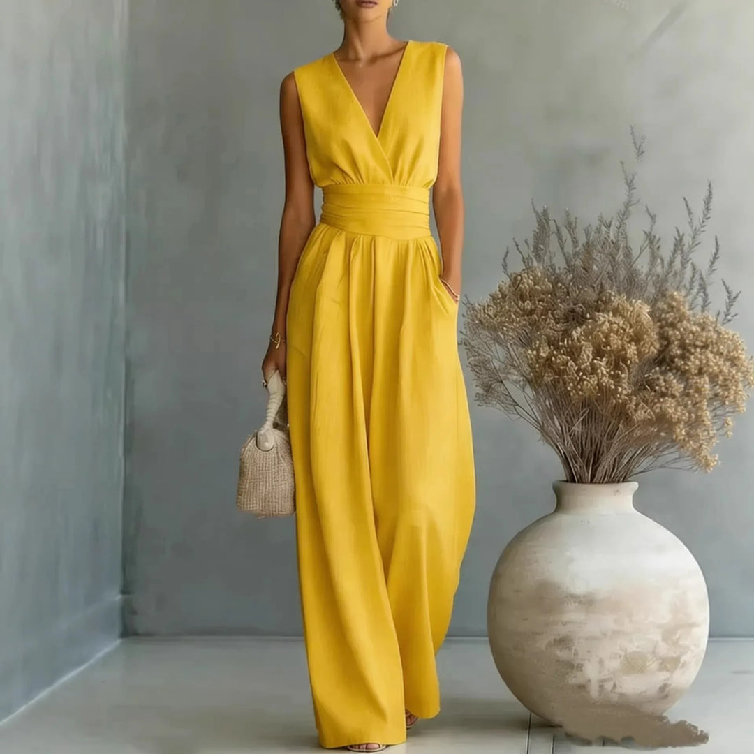 Women's elegant sleeveless V-neck wide-leg jumpsuit. Ideal for formal wear, summer, or casual chic.