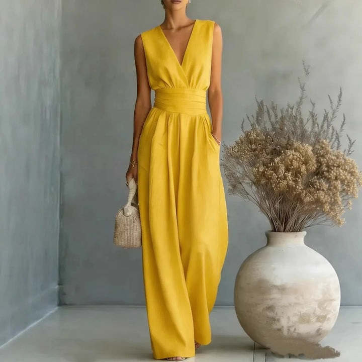 Women's elegant sleeveless V-neck wide-leg jumpsuit. Ideal for formal wear, summer, or casual chic.