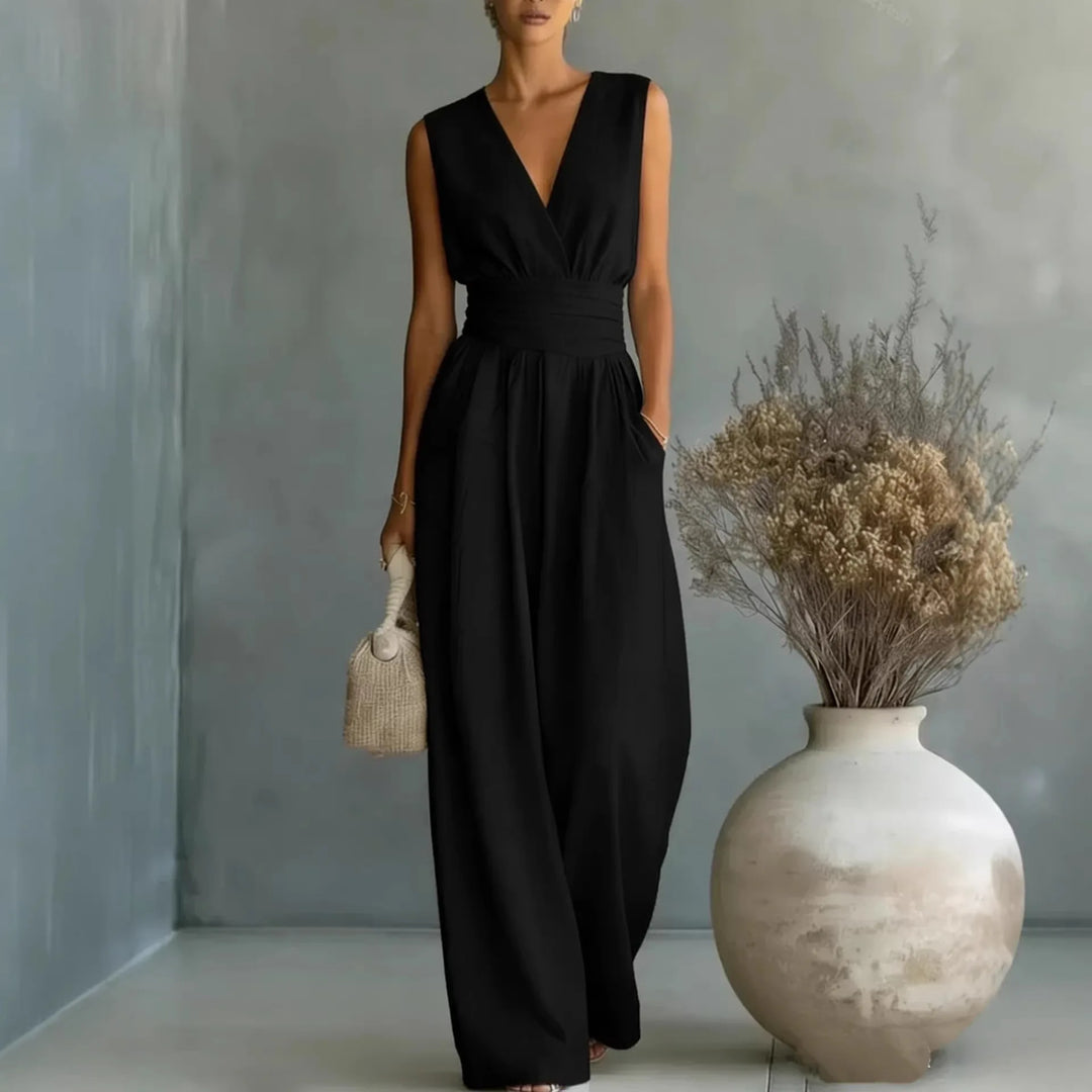 Stylish women's sleeveless V-neck jumpsuit featuring wide-legs & high waist for an elegant look.
