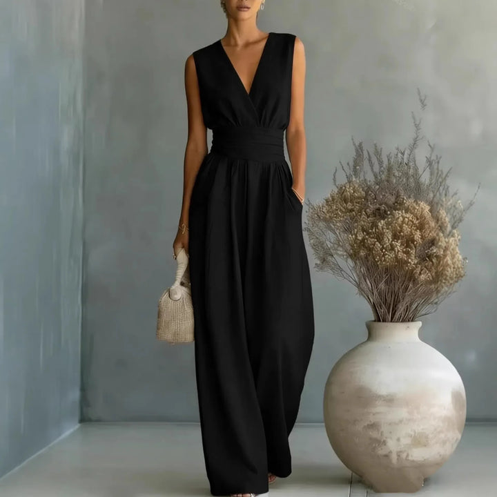 Stylish women's sleeveless V-neck jumpsuit featuring wide-legs & high waist for an elegant look.