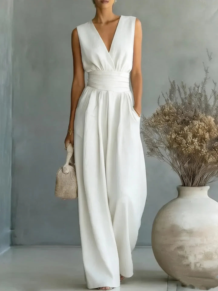 Fashionable women's elegant sleeveless wide-leg jumpsuit with a flattering V-neck, great for summer.