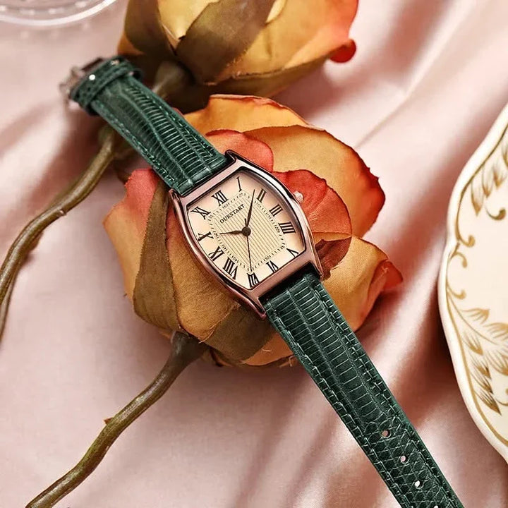 Elegant women's slim wristwatch featuring classic Roman numerals and a sophisticated design, perfect for dress wear.