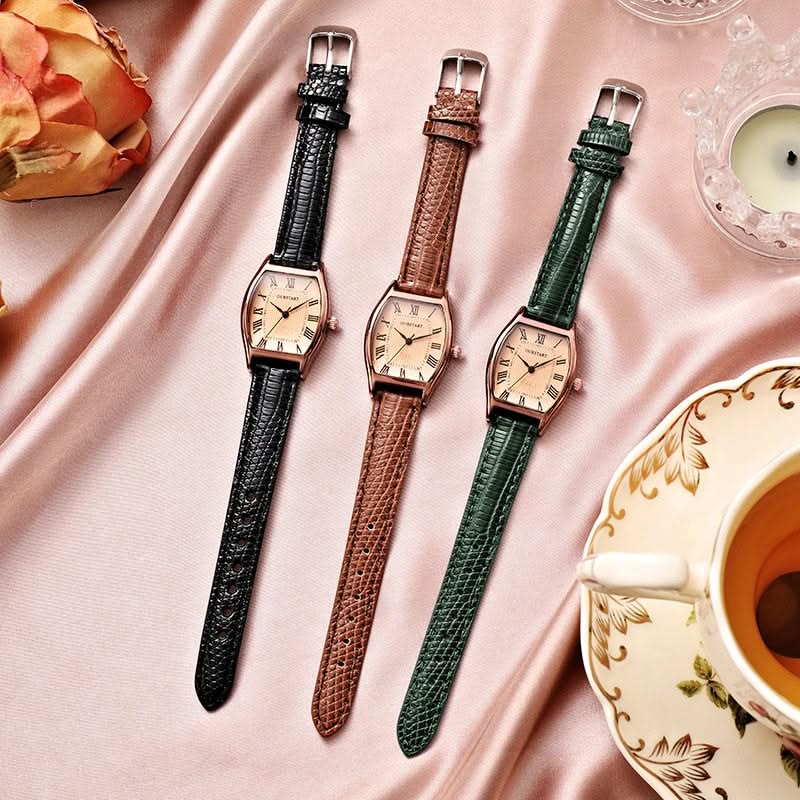 Side view of an elegant women's slim wristwatch, highlighting its sleek profile and classic Roman numeral dial.