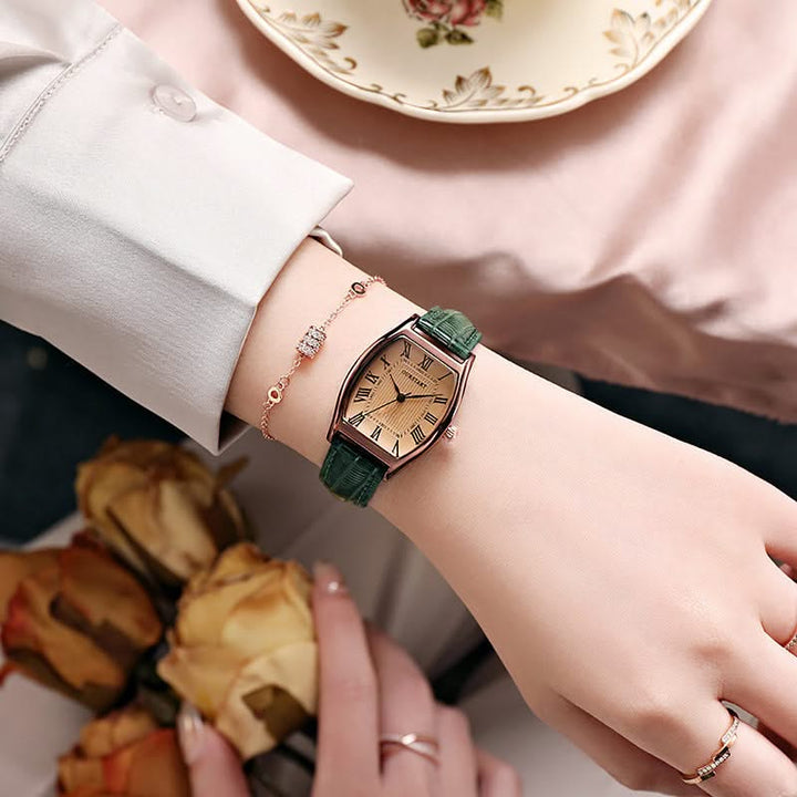 Classic women's slim wristwatch with elegant Roman numerals & an adjustable band, a timeless and stylish accessory.