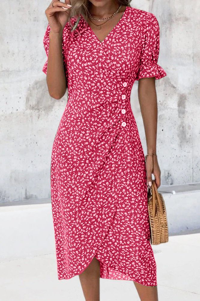 Soft, flowy material of an elegant women's pleated midi dress, offering effortless style and comfort.