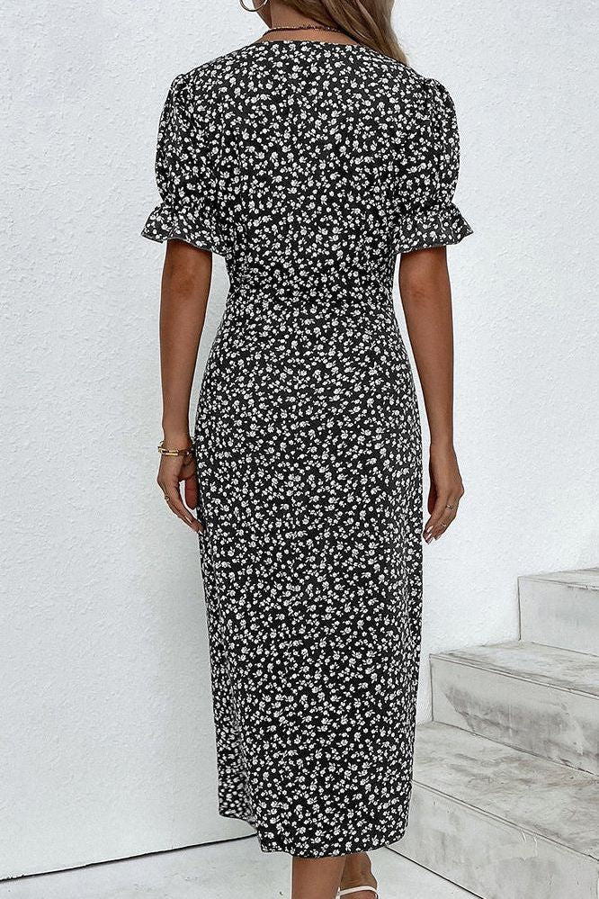 Model wearing an elegant women's soft pleated midi dress, showcasing its flattering and comfortable fit.