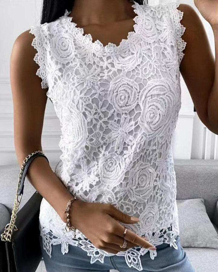 Elegant women's solid color sleeveless blouse with delicate lace details, perfect for chic business casual wear.