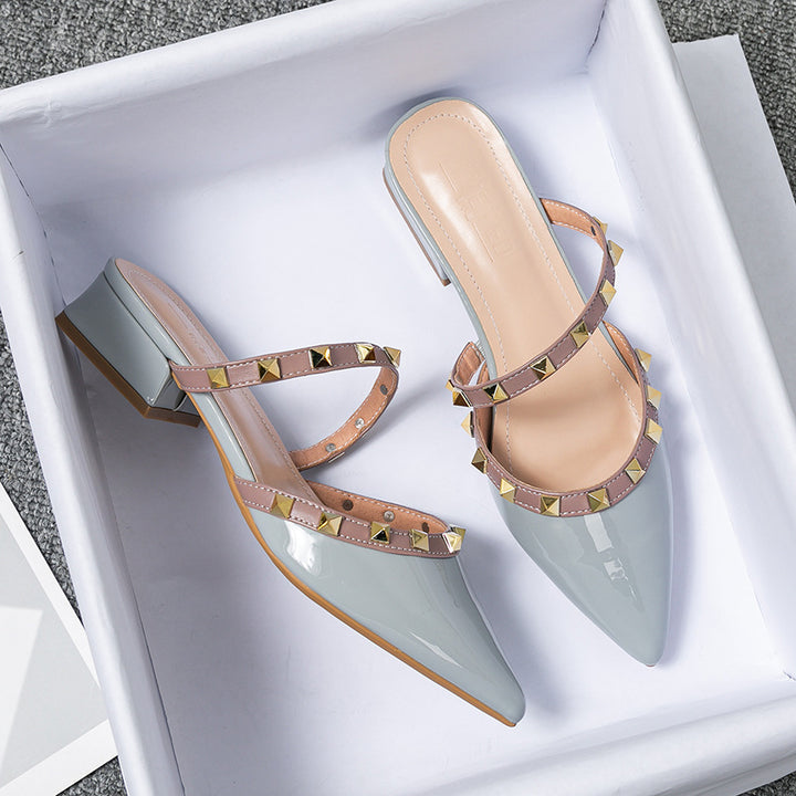 Stylish black Solin slip-on mule heels for women. Comfortable & chic low profile footwear perfect for everyday wear.