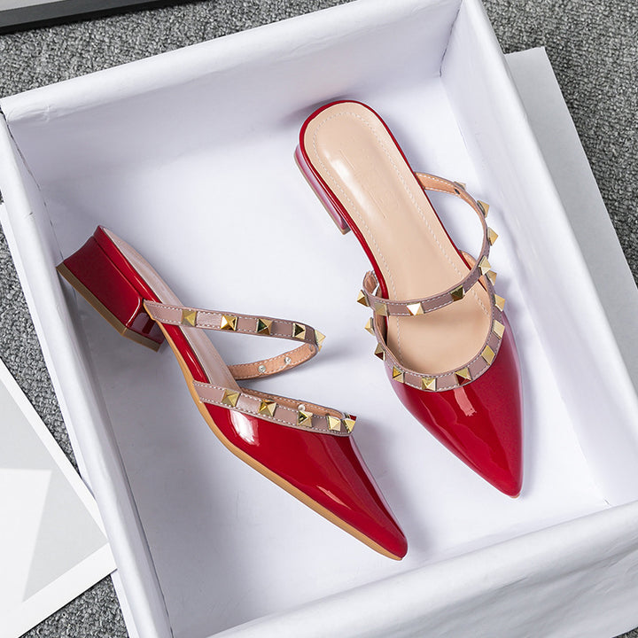 Vibrant red Solin slip-on mule heels. Elegant and chic women's footwear, perfect for adding a pop of color to outfits.