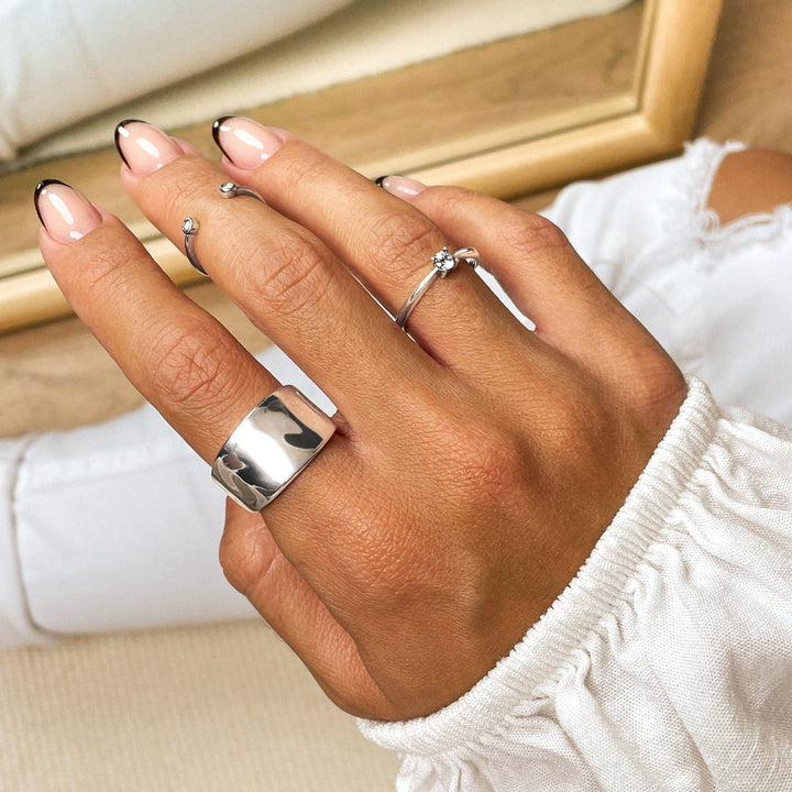 Dainty gold plated solitaire zirconia ring, ideal engagement or anniversary gift with classic sparkle.