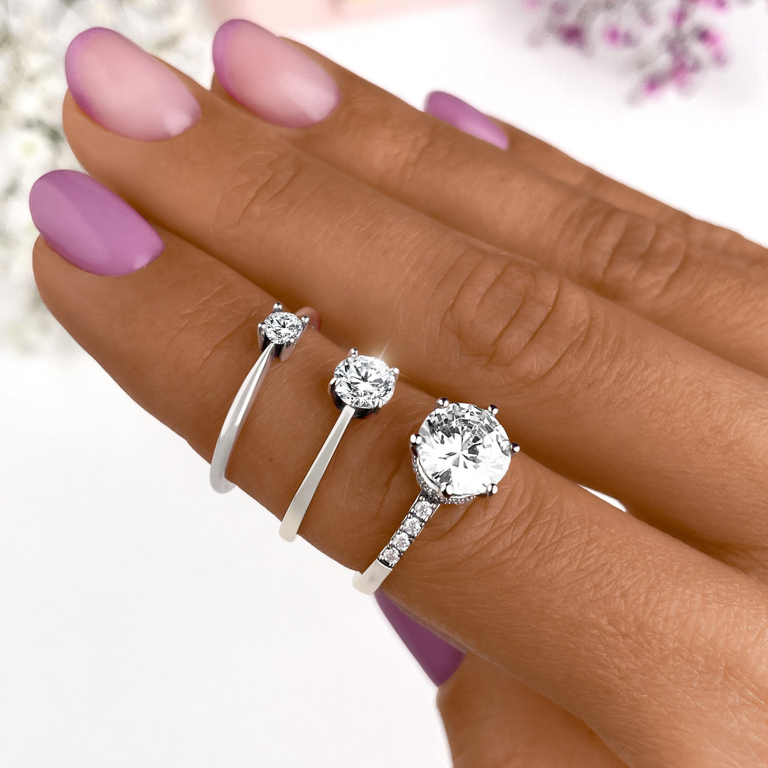 Classic women's solitaire zirconia ring, gold plated, fine jewelry offering dazzling sparkle and elegance.