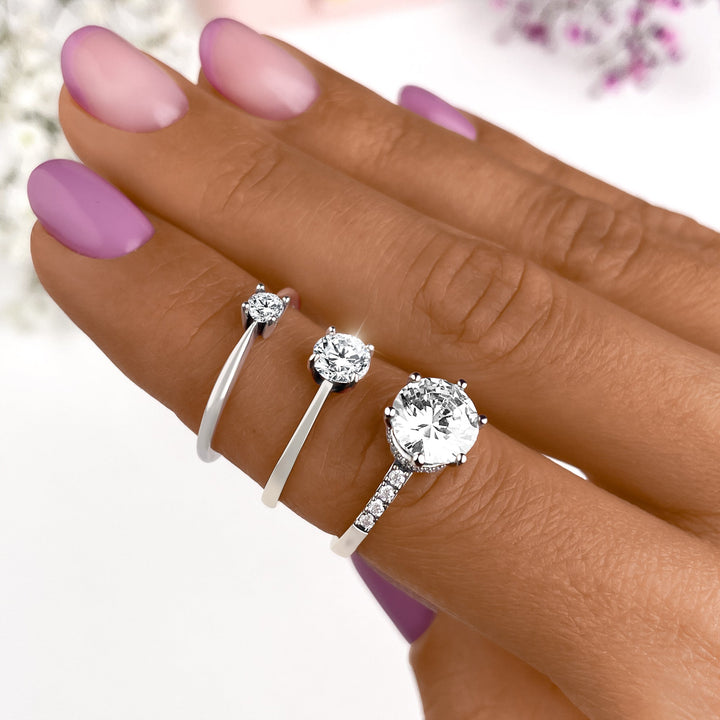 Classic women's solitaire zirconia ring, gold plated, fine jewelry offering dazzling sparkle and elegance.