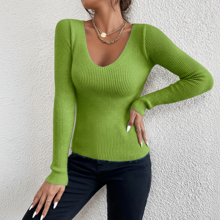 Stylish women's V-neck acrylic knit sweater, Solveig branded for casual winter fashion.
