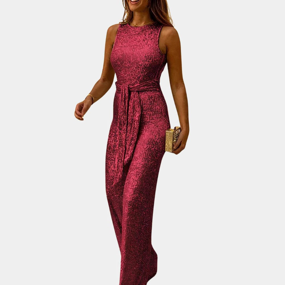 Shimmering women's sparkle jumpsuit with glitter detail, ideal formal wear for glamorous special occasions.