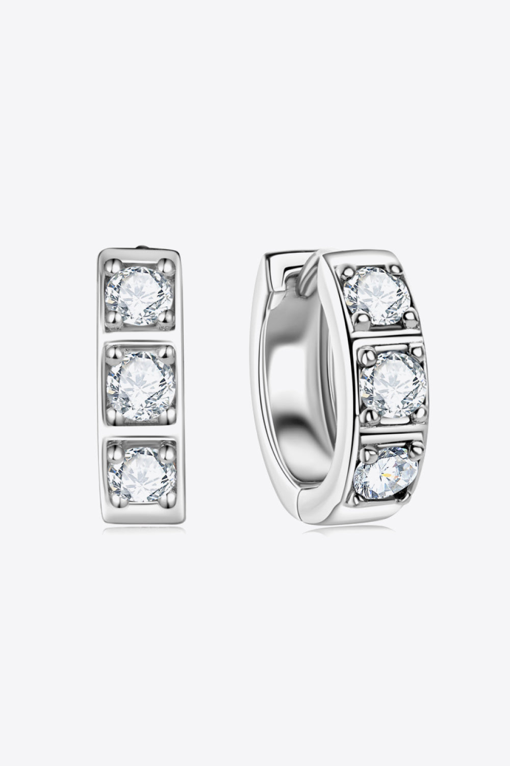 Dazzling women's silver hoop earrings with shimmering crystals, elevating your style effortlessly.