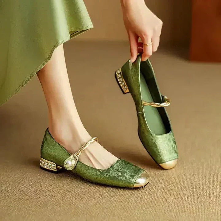 Elegant women's sparkling Mary Janes with pearl strap & low block heel. Perfect dress shoes.