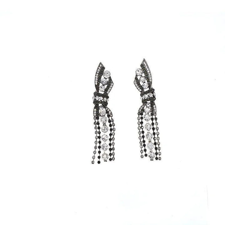 Elegant women's sparkling silver butterfly bow pendant earrings, perfect for formal occasions.