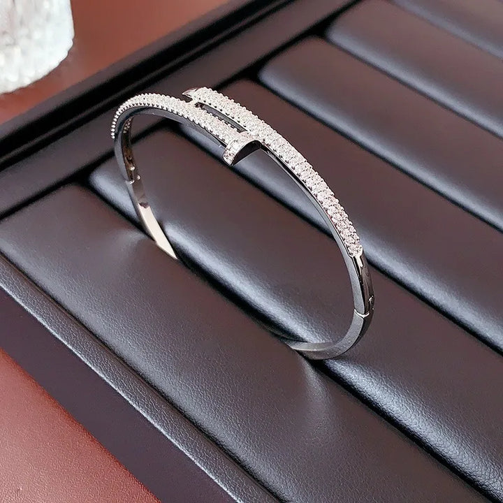 Adjustable women's sparkling zircon cuff bracelet with elegant nail design, a perfect jewelry gift for her.