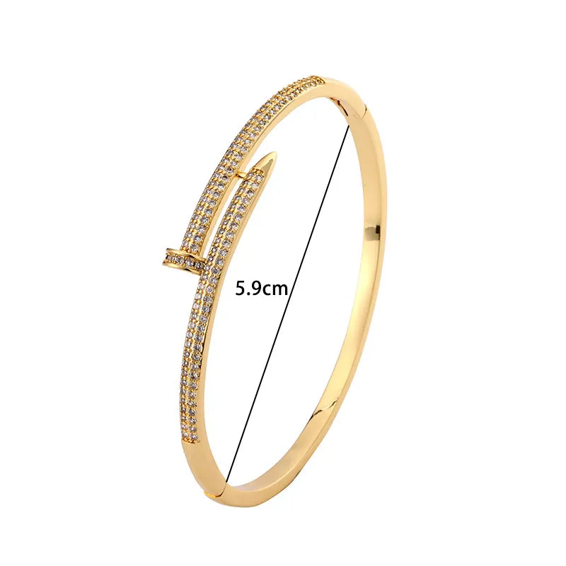 Timeless women's elegant sparkling zircon nail bracelet, a versatile gold plated fashion jewelry piece.