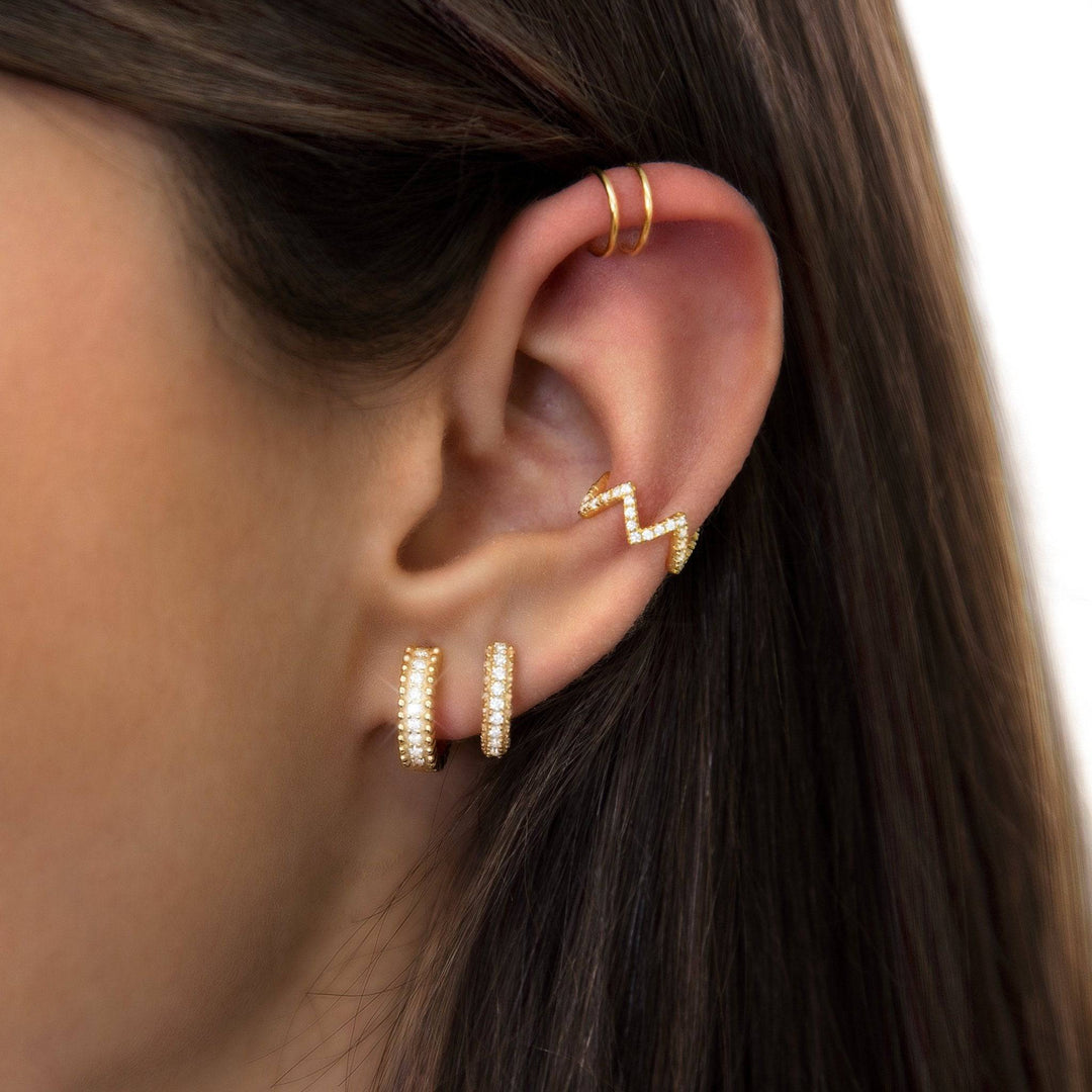 Dazzling women's zirconia hoop earrings, a perfect sparkling jewelry gift for her, adding elegance to any outfit.