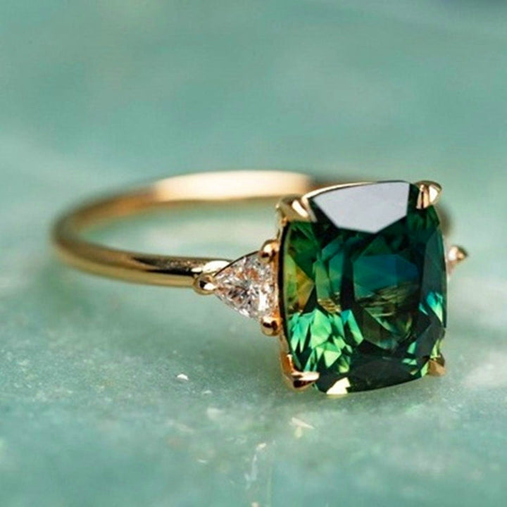 Elegant women's square emerald gemstone ring, gold plated fine jewelry. A stunning statement piece.