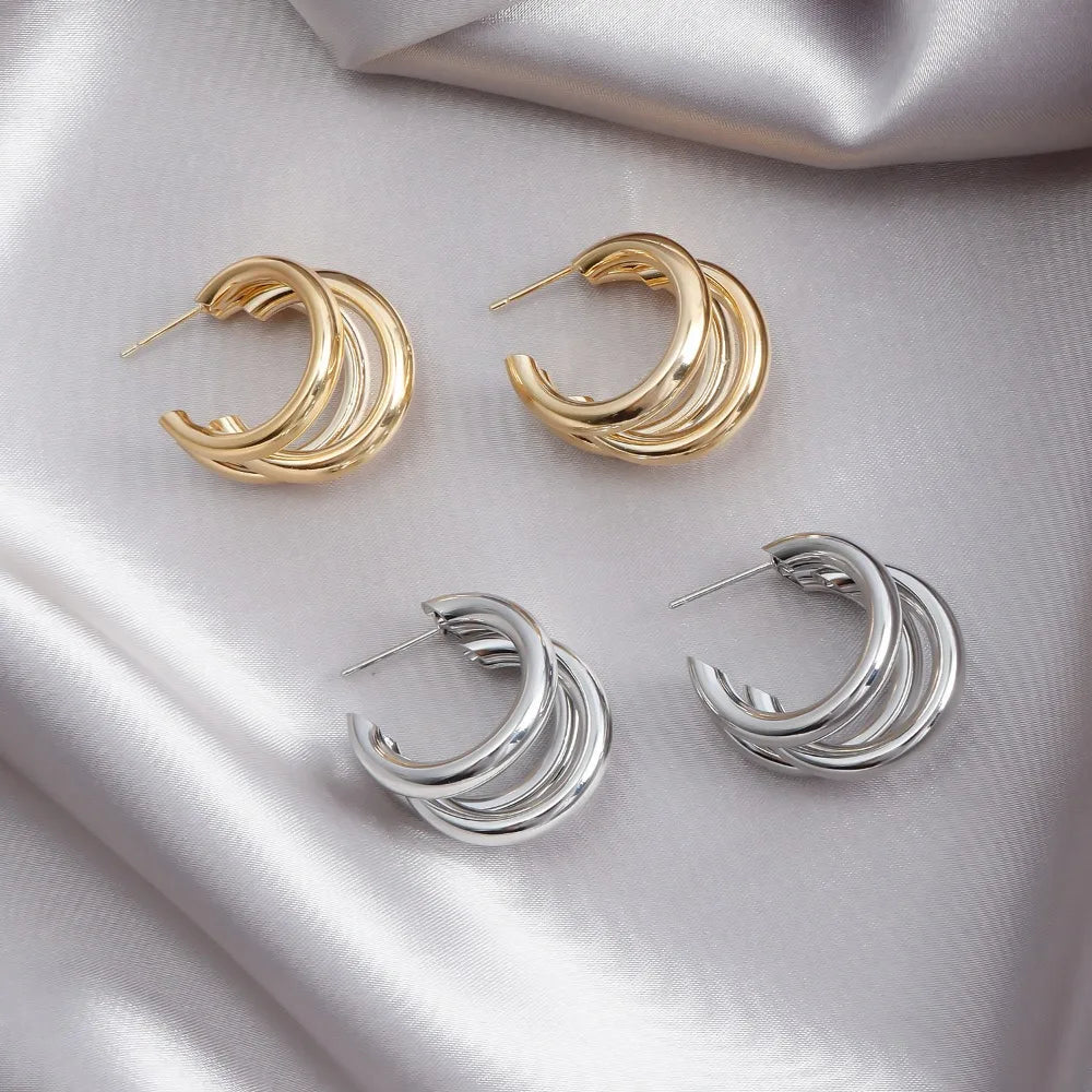Chic stacked hoop earrings for women, combining elegant gold and silver for a modern, stylish look.