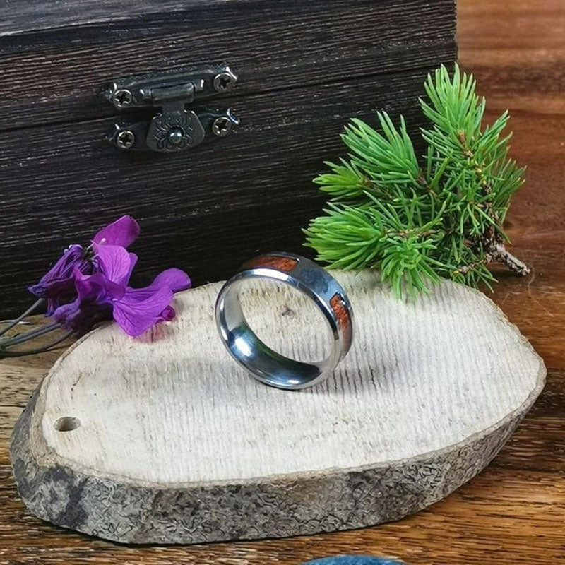 Polished stainless steel women's statement ring, an elegant & durable gift for her with unique spiritual symbols.