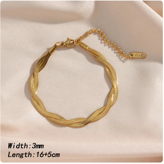 Complete women's elegant twist stainless steel necklace and bracelet set. A perfect jewellery gift.