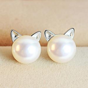 Elegant women's sterling silver cat ear dangle earrings with natural freshwater pearls. Unique animal jewelry gift.