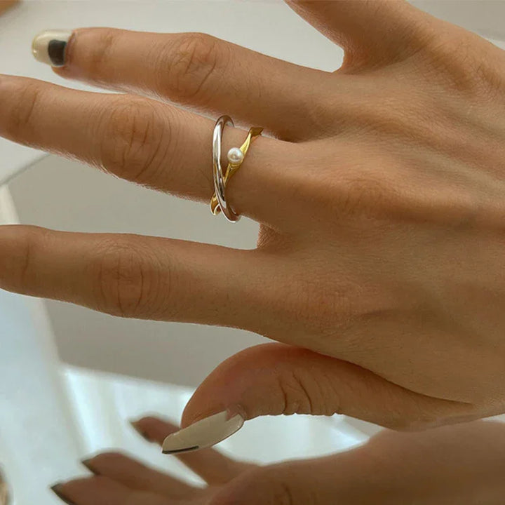 Hypoallergenic sterling silver crossed ring with a beautiful pearl, an elegant gift for her.