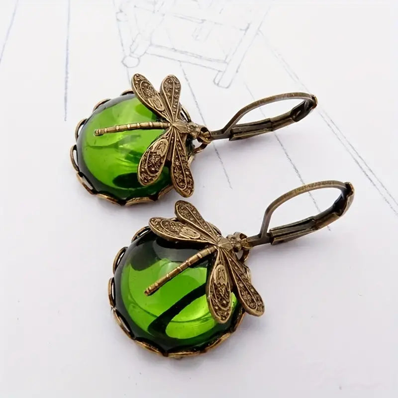 Whimsical nature-inspired dragonfly moonstone drop earrings for women.