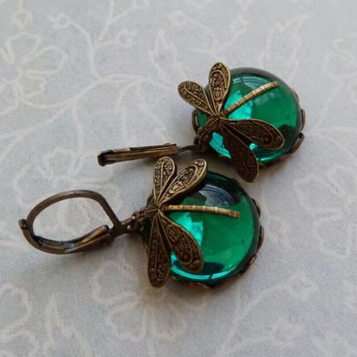 Sterling silver elegant dragonfly drop earrings with luminescent moonstone for women.