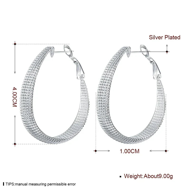 Fashionable sterling silver European drop earrings. Elegant women's dangle jewelry for a sophisticated, timeless look.